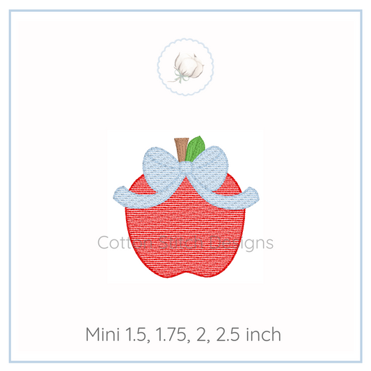 Machine Embroidery design Cotton Stitch Designs Red apple with a white bow on a white background, featuring Cotton Stitch Designs branding.