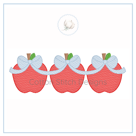 Machine Embroidery design Cotton Stitch Designs apples with bows on a white background.