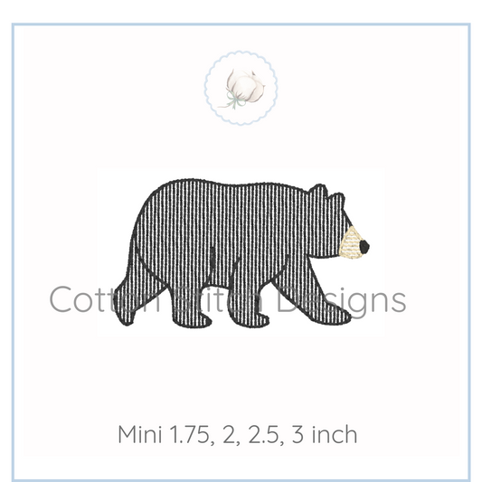 Machine Embroidery design Cotton Stitch Designs Embroidery design of a bear with a white background.
