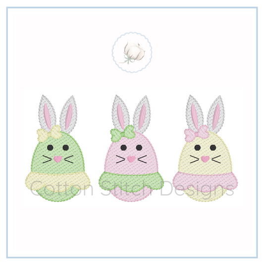 Machine Embroidery design Cotton Stitch Designs Three embroidered bunny face designs on a white background with 'Cotton and Design' branding.
