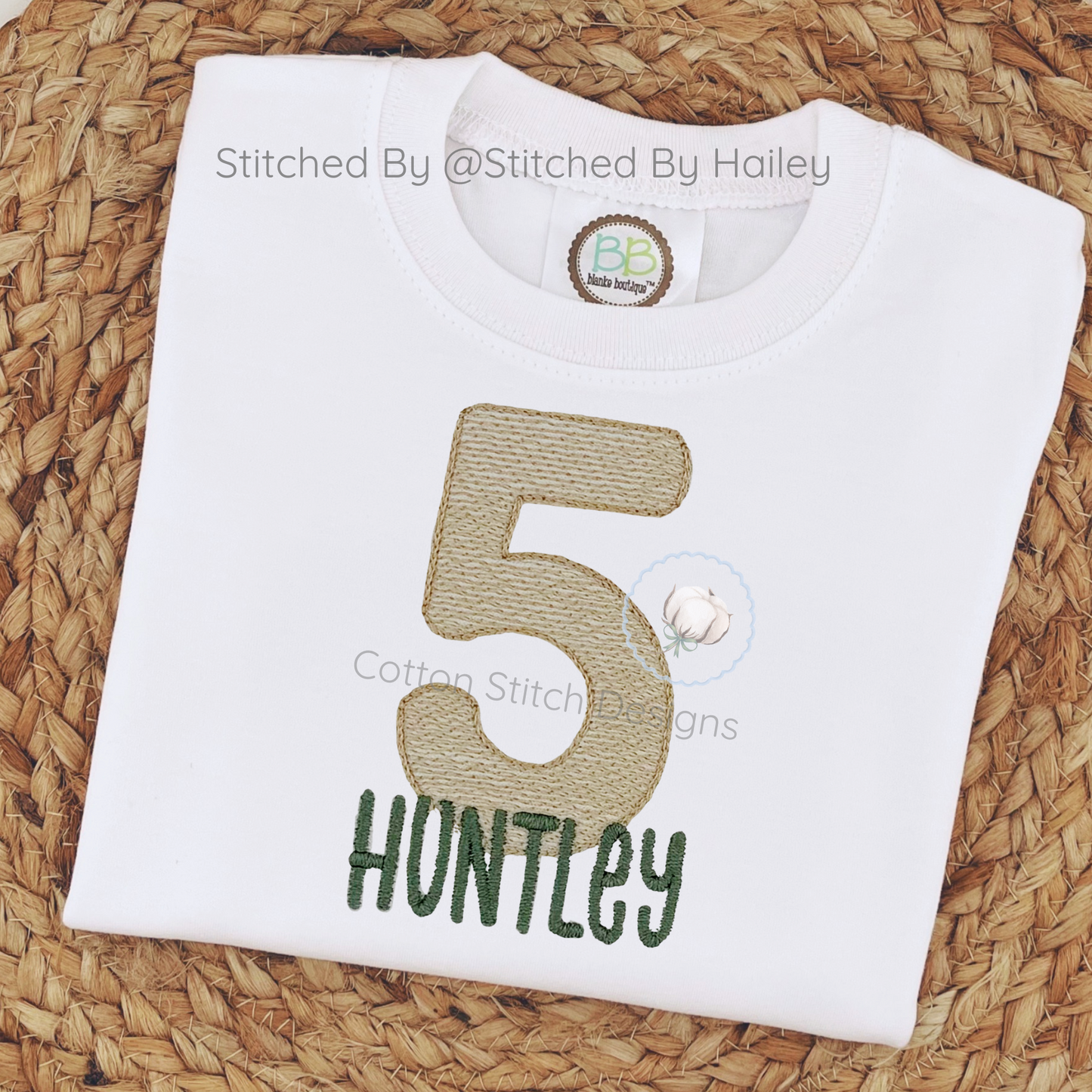 Machine Embroidery design Cotton Stitch Designs White shirt with brown number '5' and name 'Huntley' on a woven surface