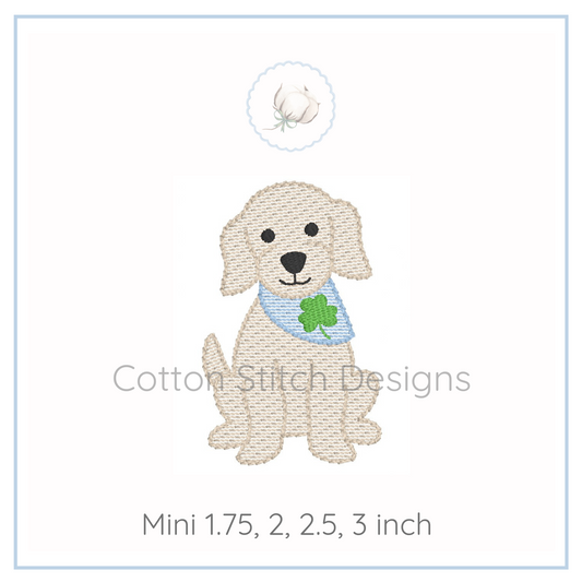 Machine Embroidery design Cotton Stitch Designs Embroidered design of a dog with a shamrock on a white background, branded 'Cotton Stitch Designs'.