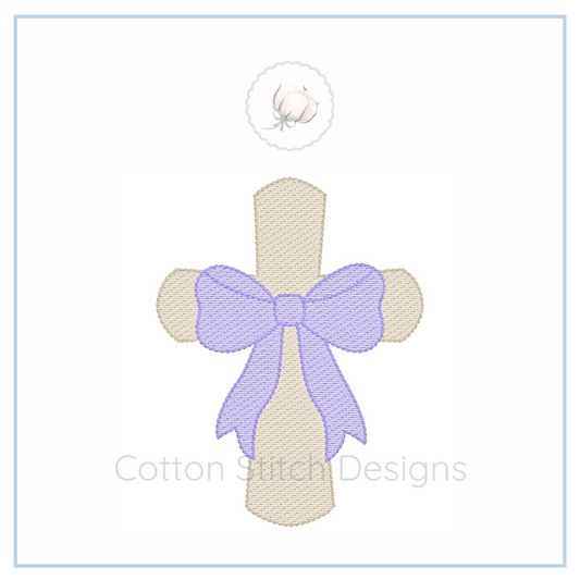 Machine Embroidery design Cotton Stitch Designs Embroidered cross with a purple bow on a white background, featuring the brand 'Cotton Stitch Designs'.
