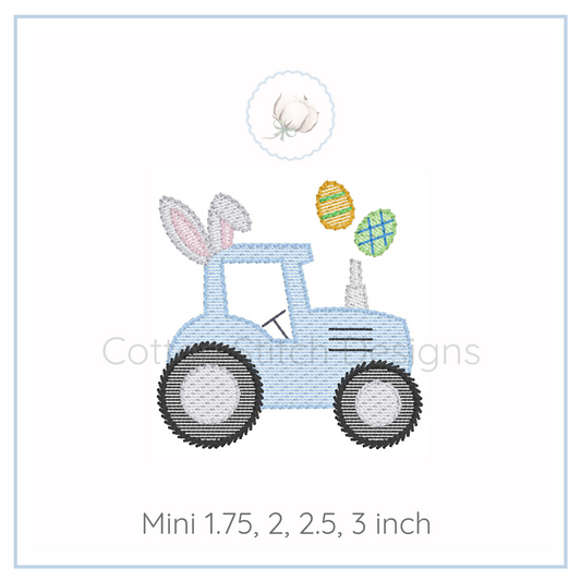 Machine Embroidery design Cotton Stitch Designs Embroidered design of a blue tractor with bunny ears and Easter eggs on a white background.