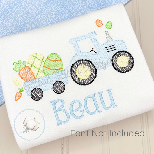 Machine Embroidery design Cotton Stitch Designs Embroidered design of a blue tractor with vegetables in the bed, on a white fabric background.