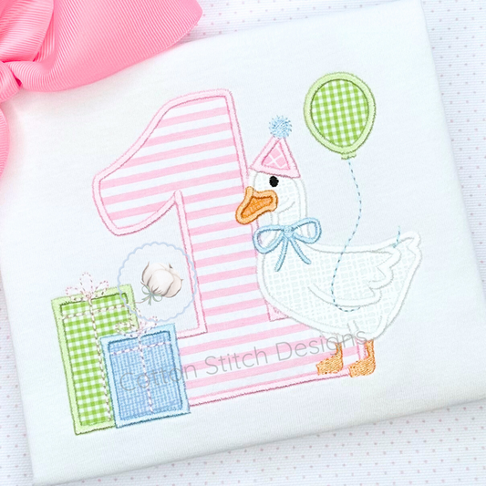 Machine Embroidery design Cotton Stitch Designs Embroidered design of a duck with a balloon and number one on a white background