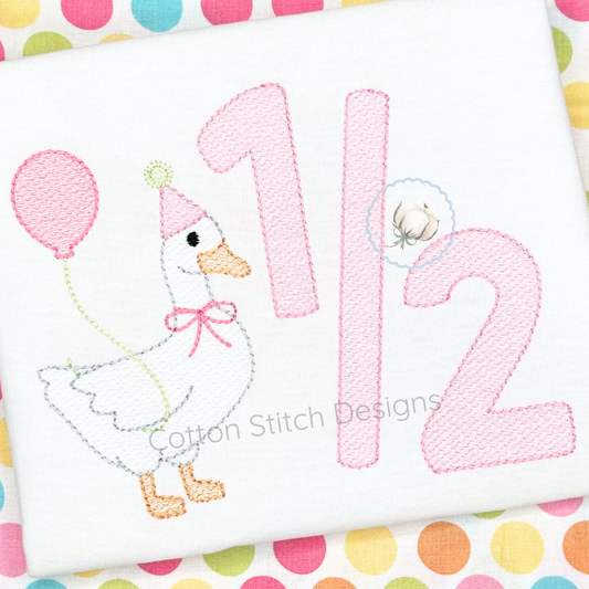 Machine Embroidery design Cotton Stitch Designs Embroidered design with a duck and numbers on a polka dot background