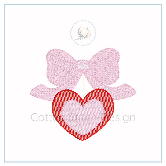Machine Embroidery design Cotton Stitch Designs Embroidered design of a pink bow with a red heart on a white background, featuring the brand 'Cotton Stitch Design'.
