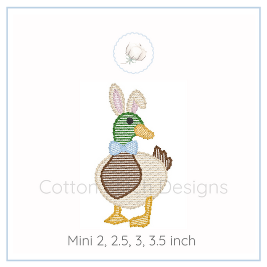 Machine Embroidery design Cotton Stitch Designs Embroidered duck design with bunny ears on a white background, labeled 'Cotton and Steel Designs'.