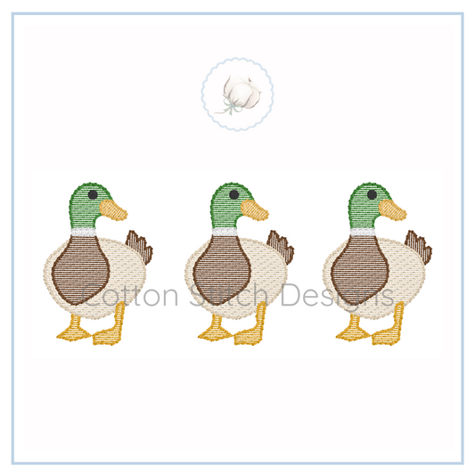 Machine Embroidery design Cotton Stitch Designs Three embroidered ducks on a white background.