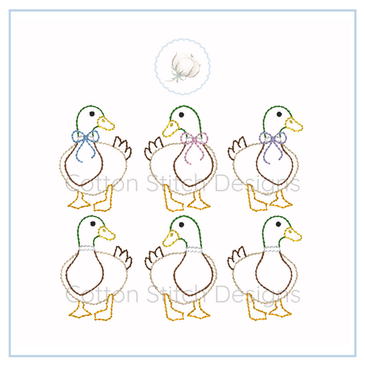 Machine Embroidery design Cotton Stitch Designs Five embroidered ducks with colorful bows on a white background, featuring Cotton Stitch Designs logo.