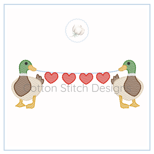 Machine Embroidery design Cotton Stitch Designs Two ducks holding a string with red hearts and 'Cotton Stitch Design' text.