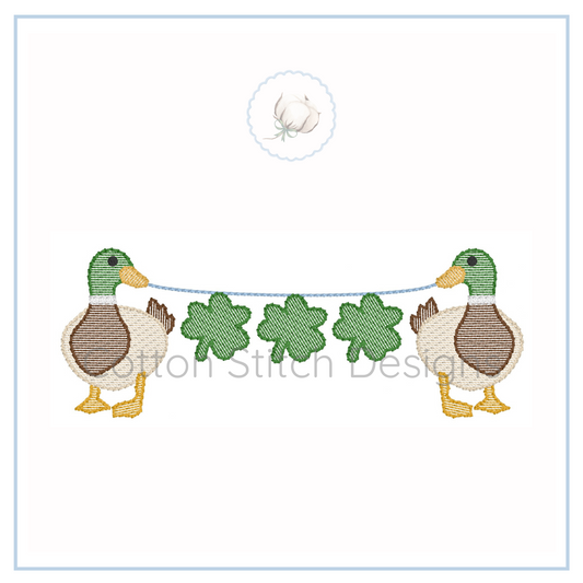 Machine Embroidery design Cotton Stitch Designs Embroidery design of two ducks and four clover leaves on a string with a white background.