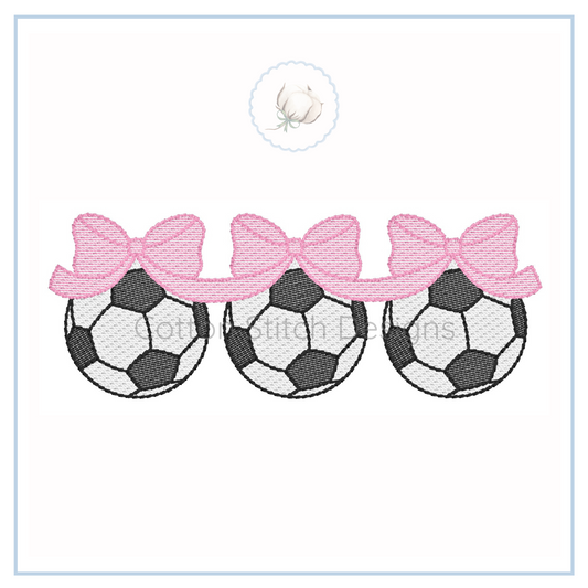 Machine Embroidery design Cotton Stitch Designs Three soccer ball designs with pink bows on a white background