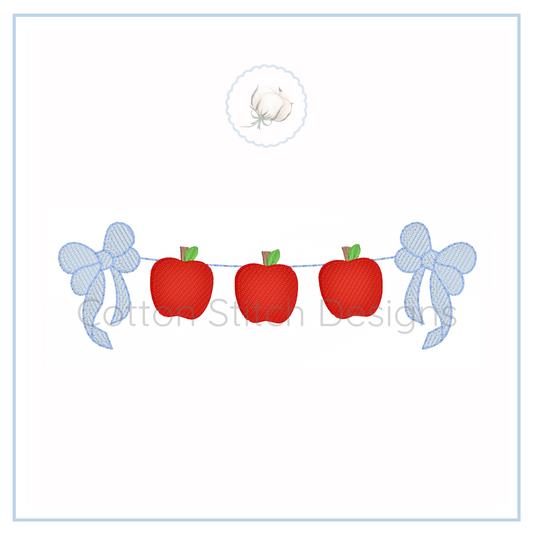 Machine Embroidery design Cotton Stitch Designs Design of red apples with green leaves and blue ribbons on a white background