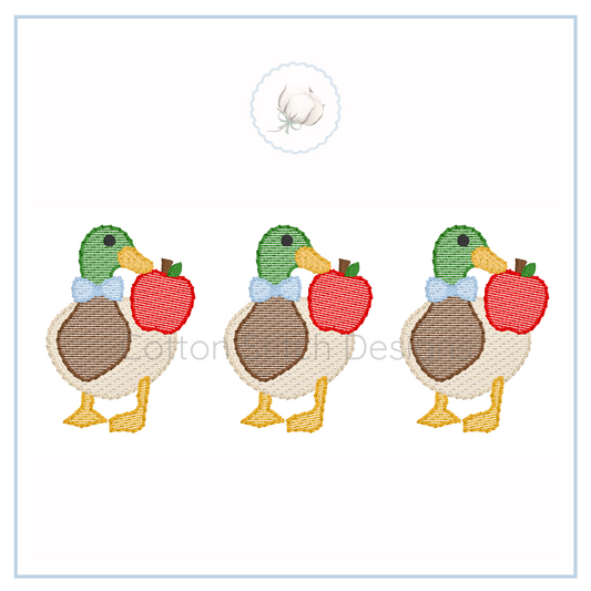 Machine Embroidery design Cotton Stitch Designs Three cartoon ducks holding red apples on a white background