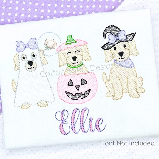 Machine Embroidery design Cotton Stitch Designs Embroidered design of three dogs with Halloween-themed accessories on a white background with a purple polka dot border.